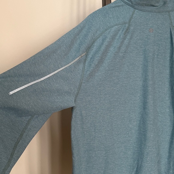 Lululemon Surge Warm 1/2 Zip size Large
Blue - Picture 5 of 10